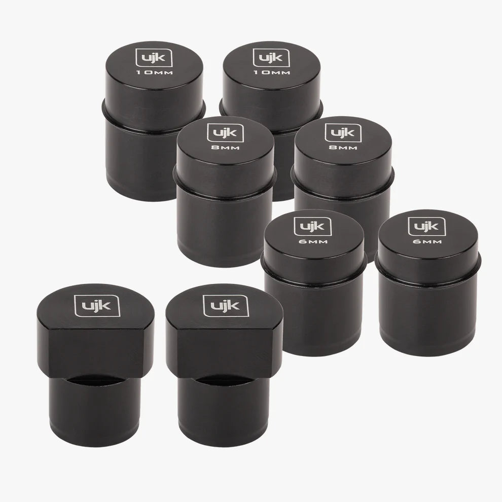 Set completo 8 spine di riferimento a basso profilo UJK in alluminio anodizzato nero: 2 spine da 10 mm, 2 da 8 mm, 2 da 6 mm a faccia arrotondata e 2 da 12 mm a faccia piatta, tutte con misura incisa sulla sommità